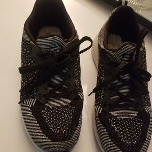 Sketchers silver and black